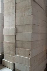 white concrete construction blocks stacked togeth