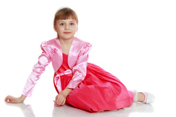 Little blonde girl in red dress.