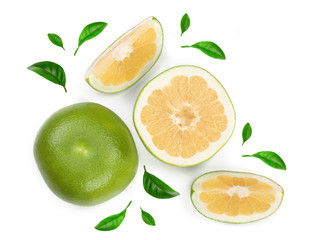 Citrus Sweetie or Pomelit, oroblanco with slices and leaf isolated on white background close-up. Top view. Flat lay