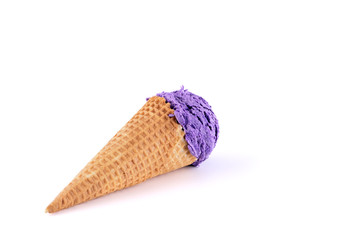 Blueberry ice cream with cone isolated on white background