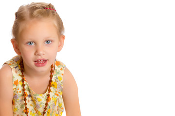 Fashionable little girl in beads.