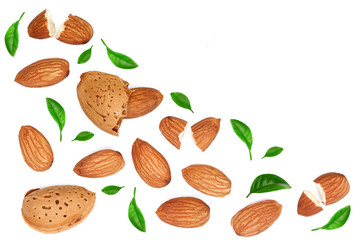almonds decorated with leaves isolated on white background with copy space for your text. Top view. Flat lay pattern
