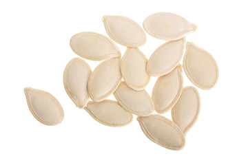 Heap of pumpkin seeds isolated on white background. Top view. Flat lay