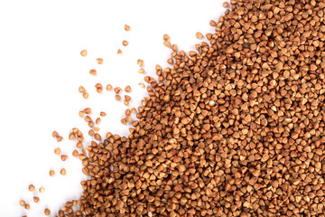 buckwheat grain isolated on white background close up with copy space for your text. Top view