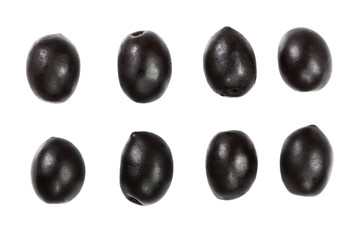 whole black olives isolated on white background. Top view. Flat lay pattern