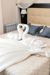 Fototapeta na wymiar wedding dress bed, preparing in hotel