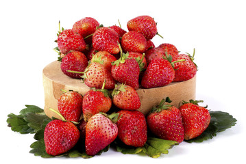 Pile of fresh strawberries isolated on white background