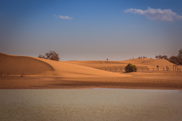 MASPALOMAS, GRAND CANARIA / SPAIN - FEBRUARY 20 2018: SAND DUNES AND MASPALOMAS BEACH ON SUNNY DAY