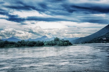 River view with mountains and beautiful sky.