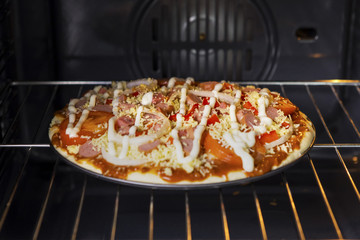Yummy pizza baked in the oven