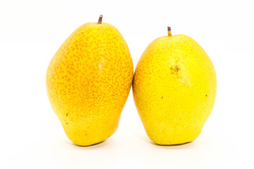 Closeup of two yellow Fresh ripe organic pears on white background