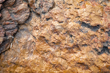 Orange stone background, geology close up