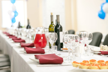 Served banquet big table with snacks