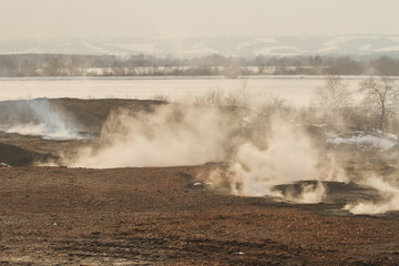 Fototapeta na wymiar smoke on slag dump, pollution