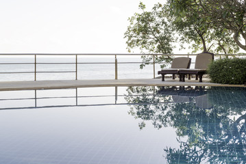 Swimming pool and tree in the morning.