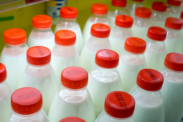 Milk in plastic bottles on the market