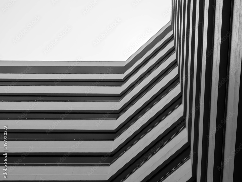 Poster Looking up to sky from modern concrete building,Abstract layer of architecture