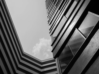 Looking up to sky from modern concrete building,Abstract layer of architecture