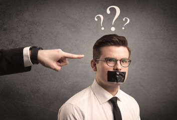 Business hand pointing at employee