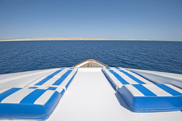 Fototapeta premium View over the bow over a large luxury motor yacht