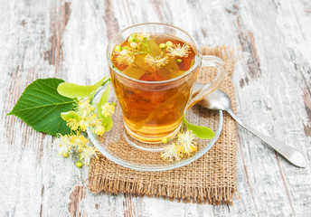 cup of herbal tea with linden flowers