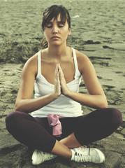 Fototapeta na wymiar woman yoga beach