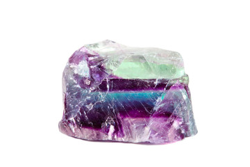 Macro shooting of natural gemstone. Raw mineral fluorite, Brazil. Isolated object on a white background.