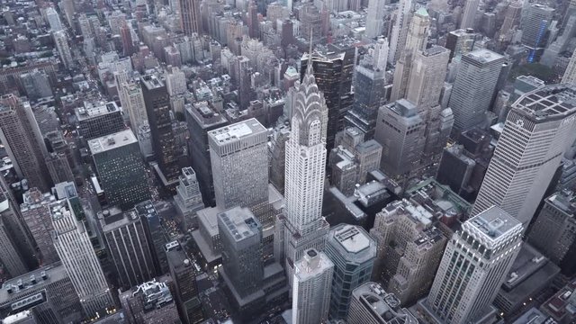New York City aerial view of Midtown Manhattan orbiting the Chrysler Building at dusk