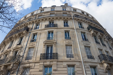 The traditional facade of Parisian building, France.