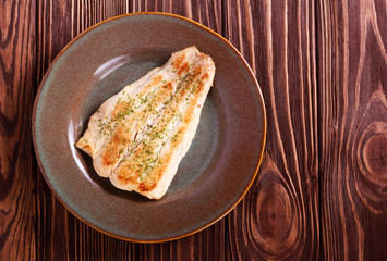 Fried fillet of bighead carp fish