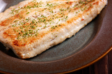 Fried fillet of bighead carp fish