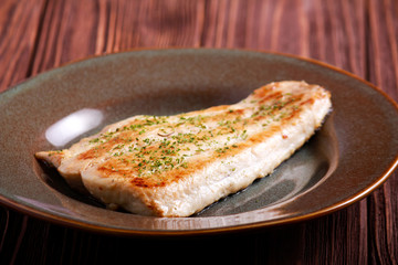 Fried fillet of bighead carp fish