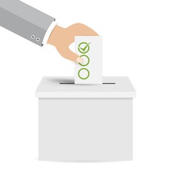 Hand putting a voting ballot in a slot of box