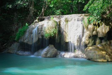 Waterfall hidden in the tropical jungle (erawan waterfall) in kanchanaburi province asia southeast asia Thailand