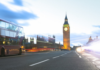 Fototapeta na wymiar London city view with Big Ben and car traffic at evening.
