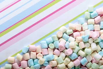 Marshmallows on a striped background .