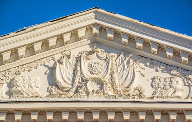 The pediment of the ancient building in the style of 