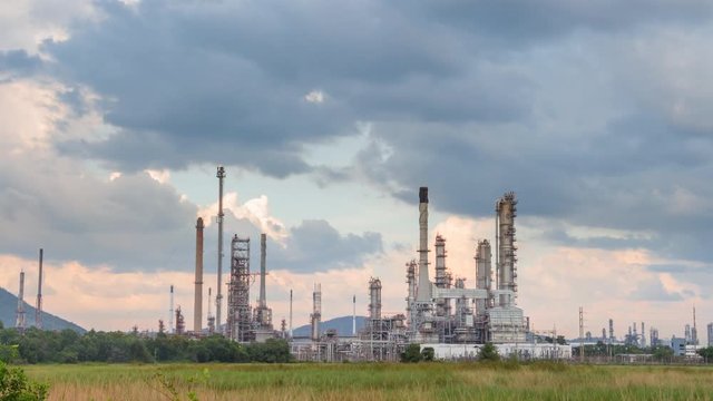 Time lapse of Oil Refinery factory at sunset, Petroleum, petrochemical plant