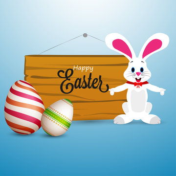 Happy Easter concept with Happy Rabbit, painted eggs and space for your text.