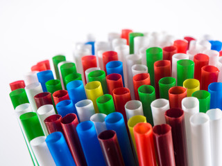 Drinking straws in many colors captured from many angles. Carrying summer hot mood with fresh and vivid shapes and colors.