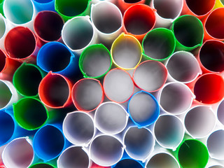 Drinking straws in many colors captured from many angles. Carrying summer hot mood with fresh and vivid shapes and colors.
