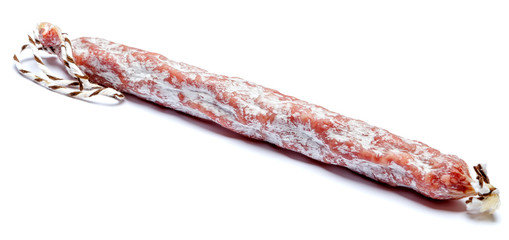 Dried organic salami sausage on white background