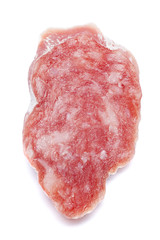 Dried sliced organic salami sausage on white background