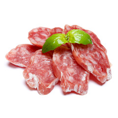 Dried sliced organic salami sausage on white background