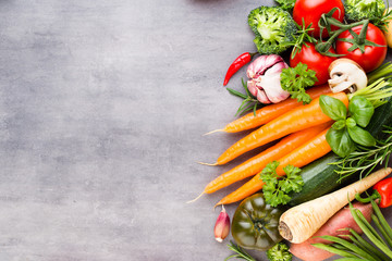 Flat lay of various colorful raw vegetables.