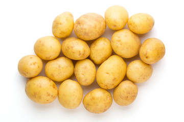 New potato and rosemarin isolated on white background close up.