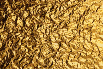 Shiny yellow leaf gold foil texture background