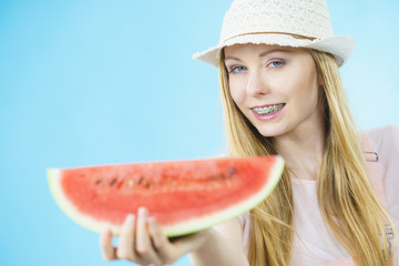 woman holding watermelon fruit