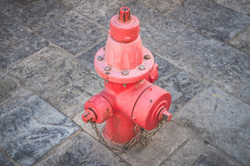 red hydrant isolated on street - vintage red hydrant