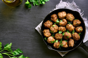 Meatballs in frying pan